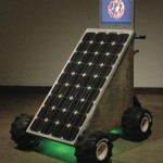 “The Sunbuggy” solar panel, galvanized steel, plastic wheels, battery, voltage inverter, electrical wiring, automotive lighting, LCD video monitor 36 ̋ x 38 ̋ x 36 